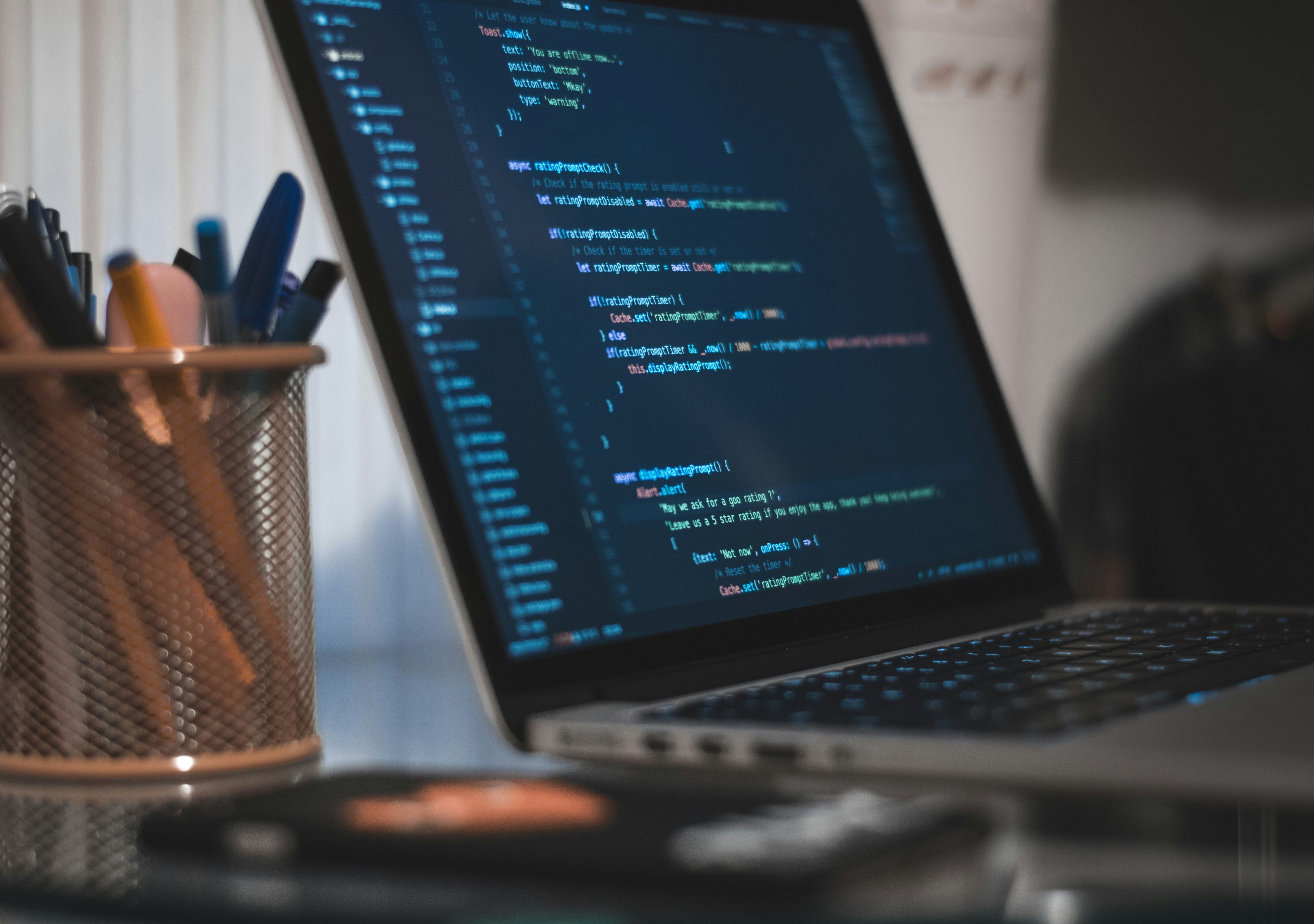 Laptop displaying code on screen